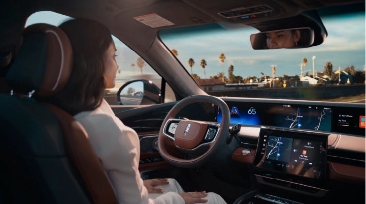 A person is shown driving hands-free on the highway with available Lincoln BlueCruise technology. | Casa Lincoln in El Paso TX