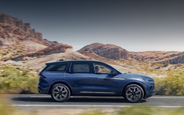 A 2024 Lincoln Nautilus® SUV is being driven in a desert setting. | Casa Lincoln in El Paso TX