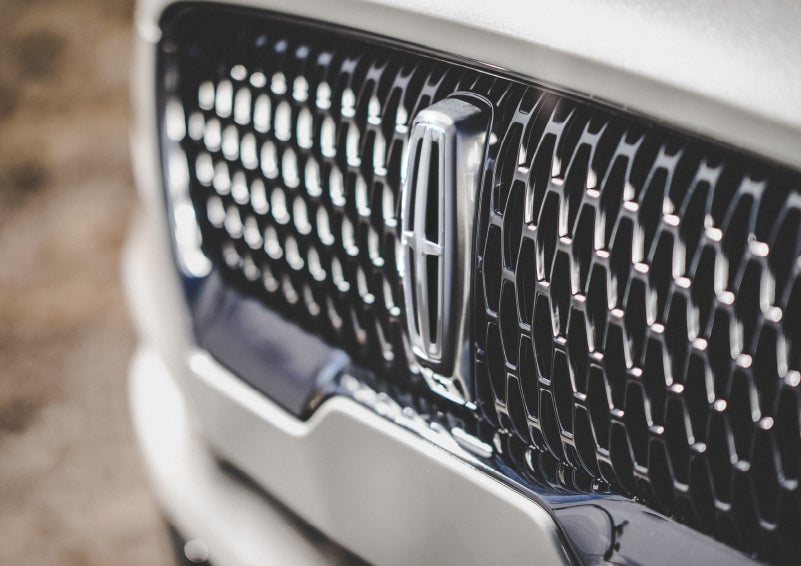 The grille of the 2024 Lincoln Aviator® Reserve model with an eye-catching repeated field of Lincoln Star logo shapes | Casa Lincoln in El Paso TX