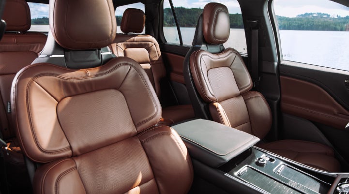 The front row's Perfect Position Seats in a 2024 Lincoln Aviator® Reserve model with Ebony Roast interior | Casa Lincoln in El Paso TX