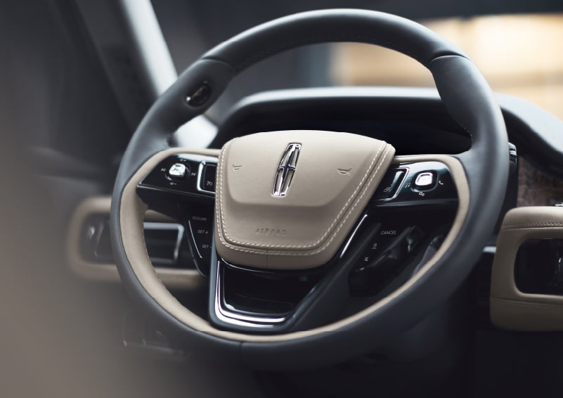 The intuitively placed controls of the steering wheel on a 2024 Lincoln Aviator® SUV | Casa Lincoln in El Paso TX