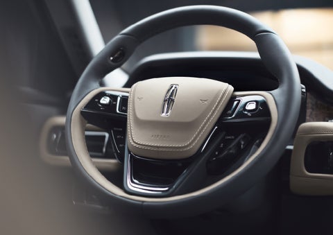 The intuitively placed controls of the steering wheel on a 2024 Lincoln Aviator® SUV | Casa Lincoln in El Paso TX