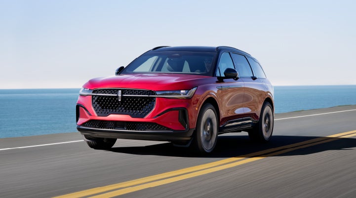 A 2024 Lincoln Nautilus® SUV is being driven on a seaside roadway. | Casa Lincoln in El Paso TX