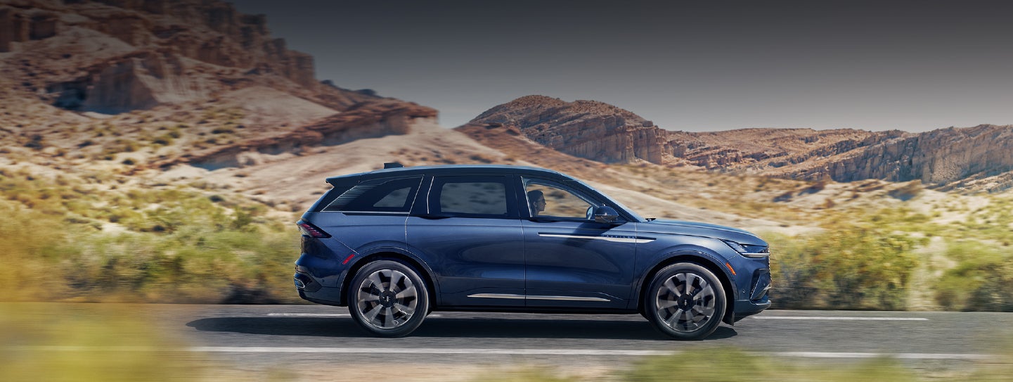 A 2024 Lincoln Nautilus® SUV is being driven in a desert setting. | Casa Lincoln in El Paso TX