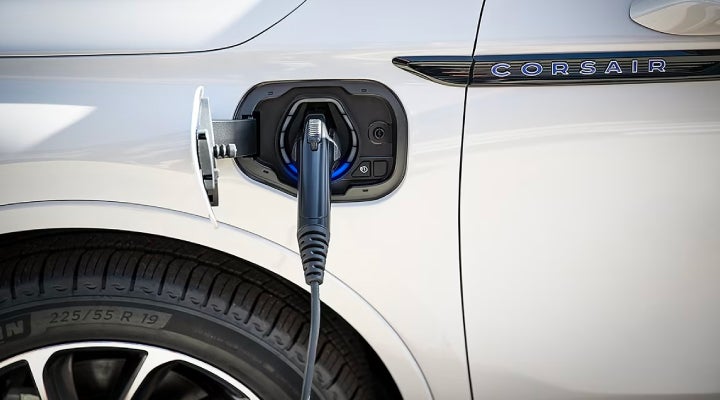 An electric charger is shown plugged into the charging port of a Lincoln Corsair® Grand Touring
model. | Casa Lincoln in El Paso TX