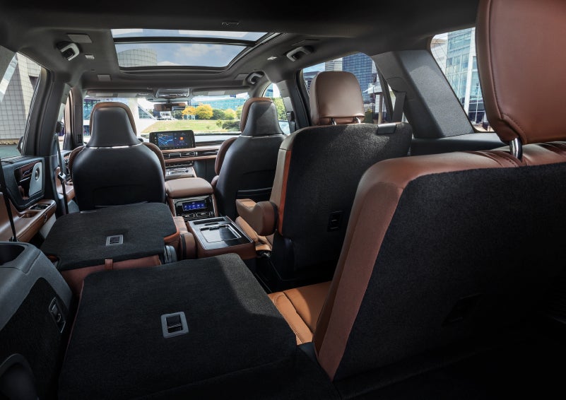 The interior of the 2025 Lincoln Aviator® SUV is shown with two seats folded down for added space. | Casa Lincoln in El Paso TX