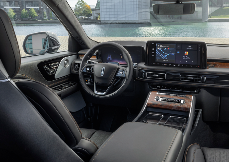 The interior of the 2025 Lincoln Aviator® SUV is shown parked with a view of a harbor through the windshield. | Casa Lincoln in El Paso TX