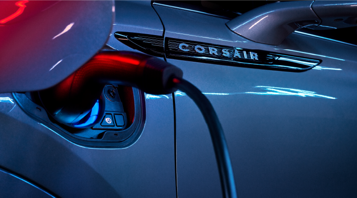 A charger plugged into the charging port of a 2025 Lincoln Corsair® Plug-in Hybrid model. | Casa Lincoln in El Paso TX