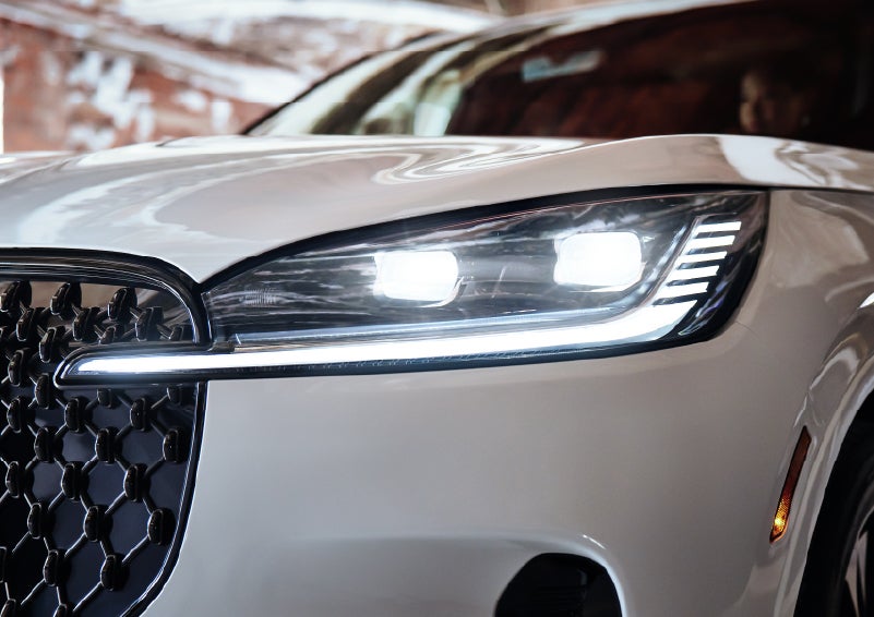 A close-up of a headlamp on the 2026 Lincoln Aviator® SUV is shown. | Casa Lincoln in El Paso TX