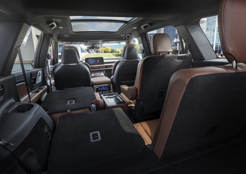 One side of the PowerFold® third-row seat and a second-row seat are folded forward in the 2026 Lincoln Aviator® SUV. | Casa Lincoln in El Paso TX