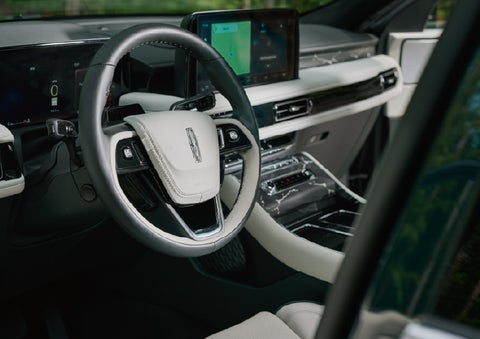 The leather-trimmed steering wheel of a 2027 Lincoln Aviator® Black Label™ SUV. | Casa Lincoln in El Paso TX