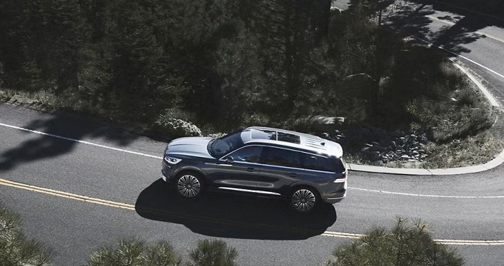 a couple taking a vehicle out for a test drive